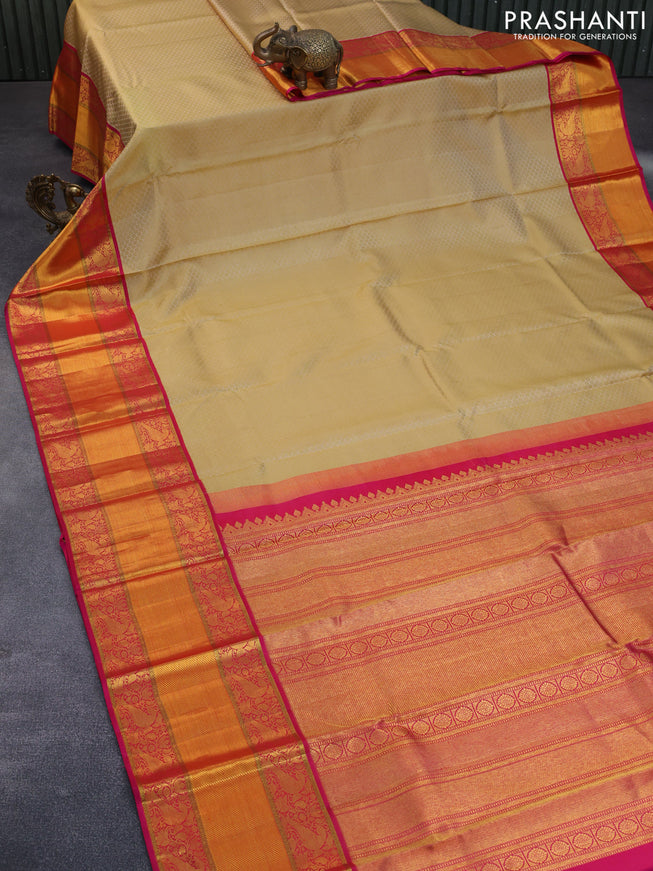 Pure kanchipuram silk saree sandal and dual shade of pink with allover self emboss and long zari woven korvai border