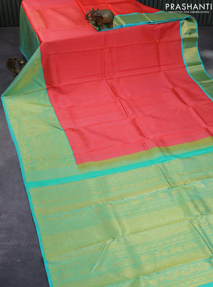 Pure kanchipuram silk saree orange and dual shade of teal bluish green with allover self emboss and long zari woven border