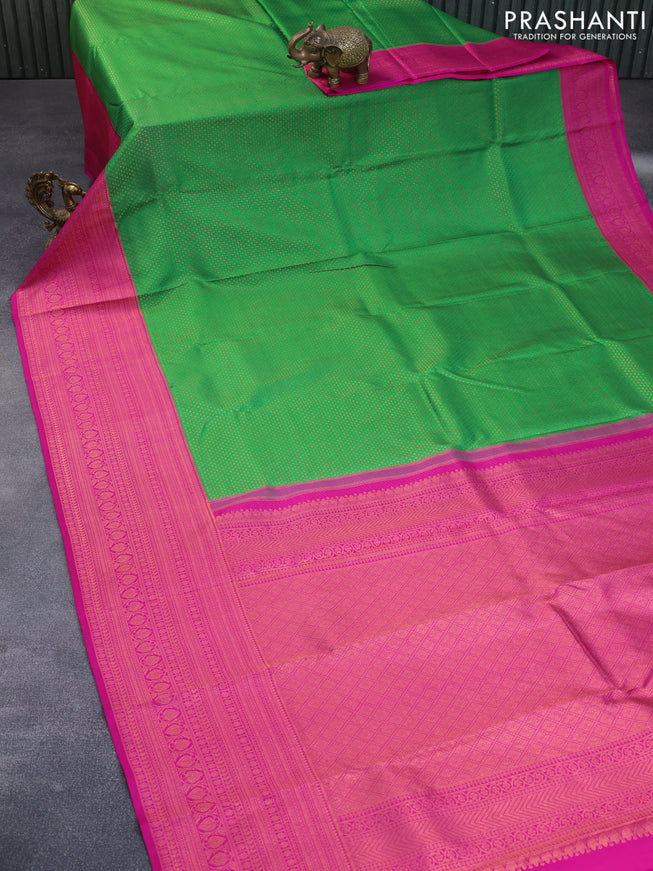 Pure kanchipuram silk saree green and pink with allover copper zari woven brocade weaves and long copper zari woven border