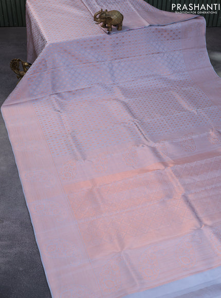 Pure kanchipuram silk saree grey with allover copper zari woven brocade weaves and zari woven border