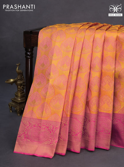 Pure kanchipuram silk saree mango yellow and pink with allover zari woven brocade weaves and zari woven floral border