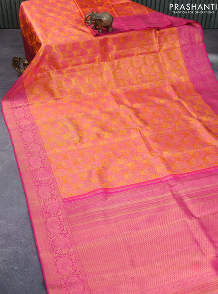 Pure kanchipuram silk saree mango yellow and pink with allover zari woven brocade weaves and zari woven floral border