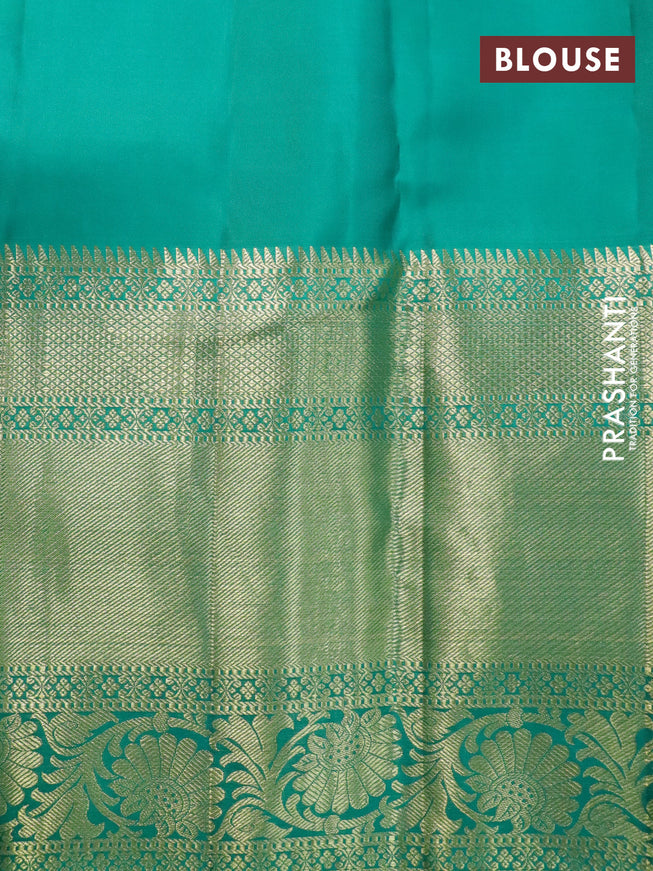 Pure kanchipuram silk saree cream and teal green with allover zari woven brocade weaves and zari woven floral border