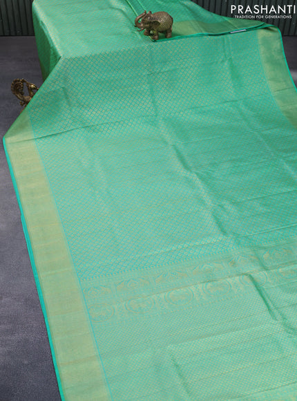 Pure kanchipuram silk saree teal green with allover zari woven brocade weaves and zari woven border