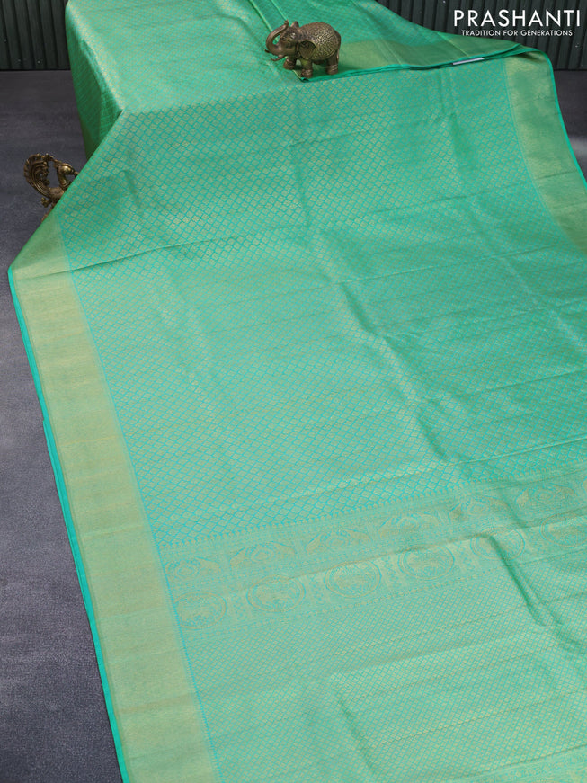 Pure kanchipuram silk saree teal green with allover zari woven brocade weaves and zari woven border