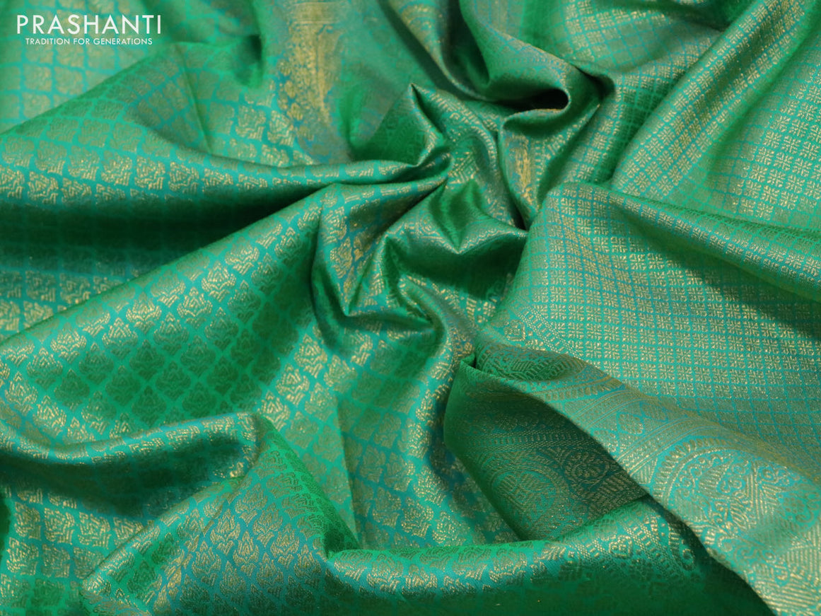 Pure kanchipuram silk saree teal green with allover zari woven brocade weaves and zari woven border