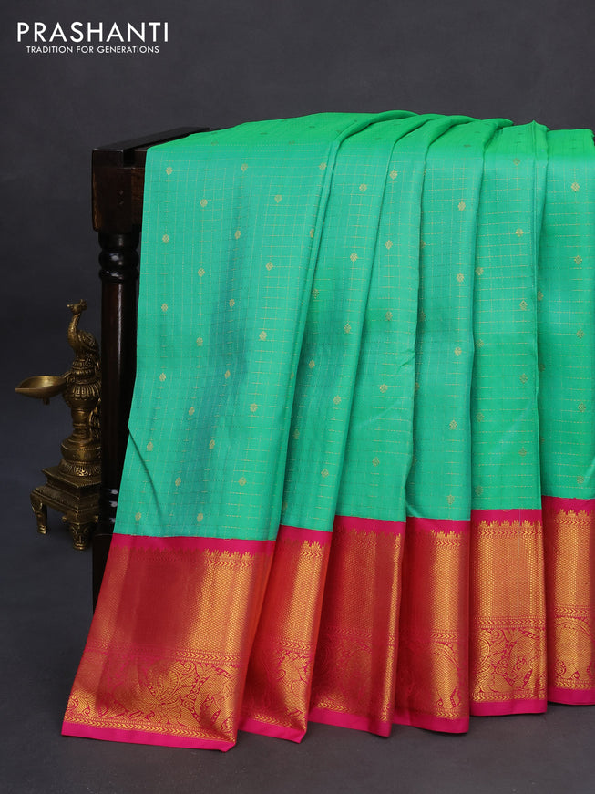 Pure kanchipuram silk saree dual shade of teal green and pink with allover zari checks & buttas and zari woven border