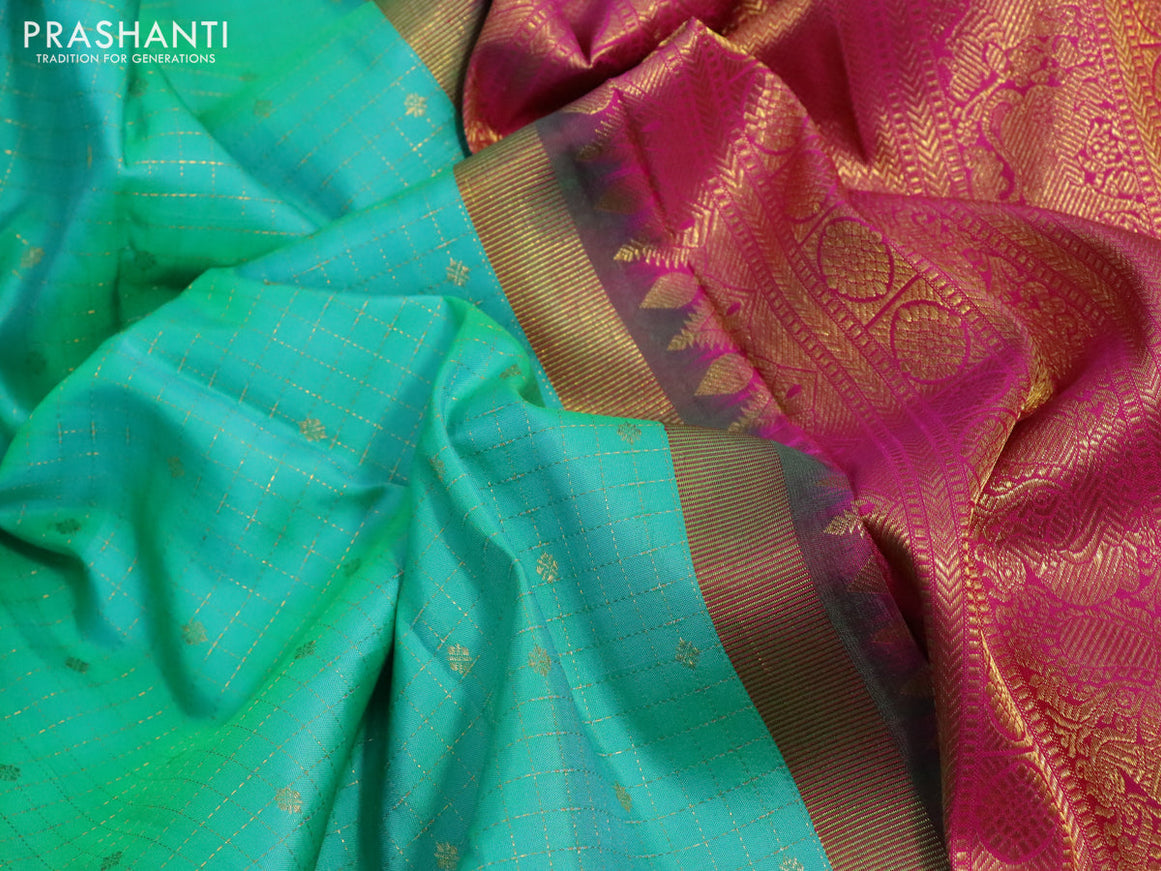 Pure kanchipuram silk saree dual shade of teal green and pink with allover zari checks & buttas and zari woven border