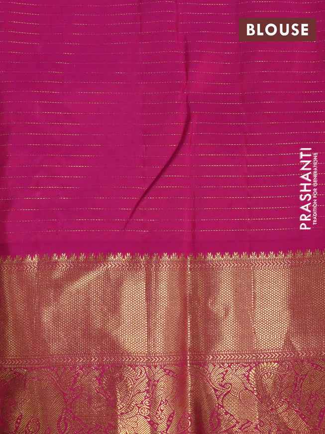 Pure kanchipuram silk saree dual shade of teal green and pink with allover zari checks & buttas and zari woven border