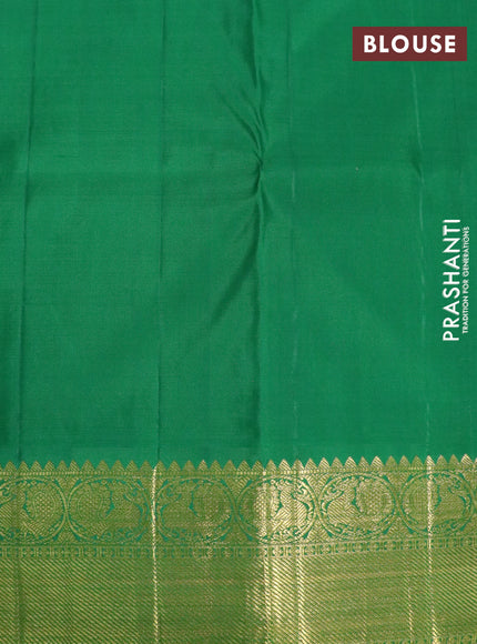 Pure kanchipuram silk saree pastel green and purple with plain body and zari woven korvai border