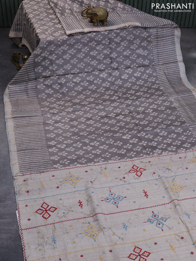 Pure tussar silk saree grey and pastel grey with alover batik prints and embroidery work pallu