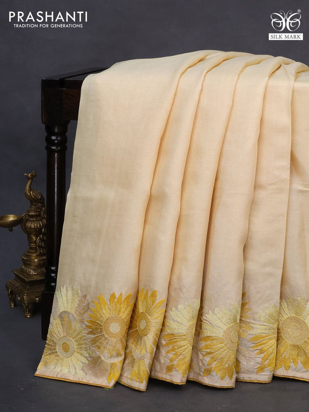 Pure tussar silk saree pale yellow with plain body and embroidery work floral border