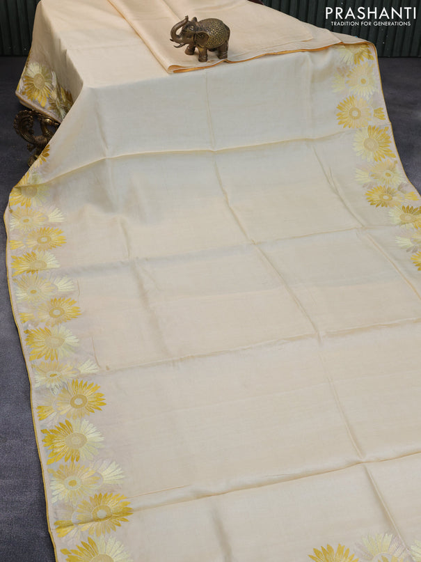 Pure tussar silk saree pale yellow with plain body and embroidery work floral border