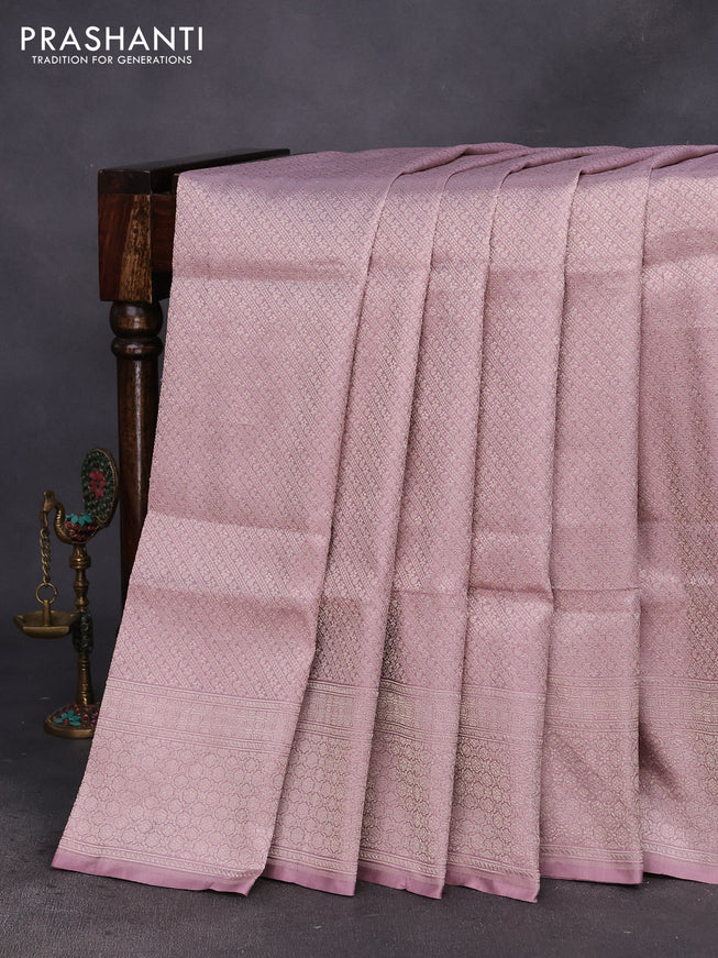 Pure banarasi uppada silk saree pastel pink with allover silver woven brocade weaves and silver zari woven border