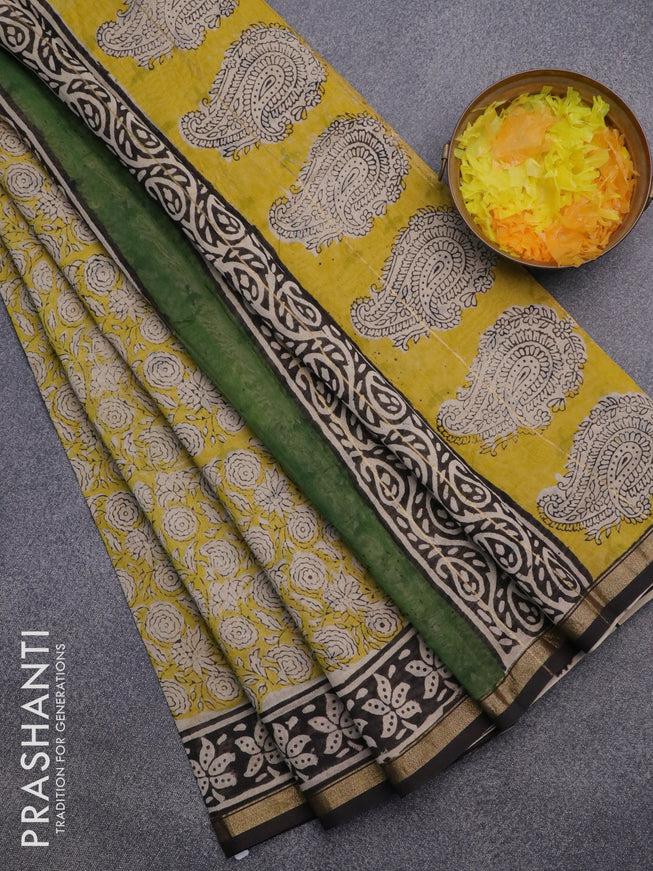 Chanderi bagru saree yellow and black with allover prints and small zari woven border