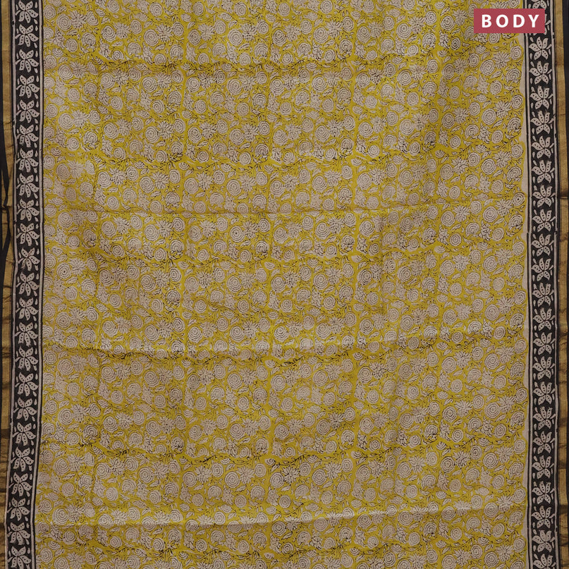 Chanderi bagru saree yellow and black with allover prints and small zari woven border