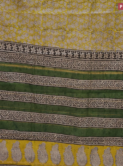 Chanderi bagru saree yellow and black with allover prints and small zari woven border