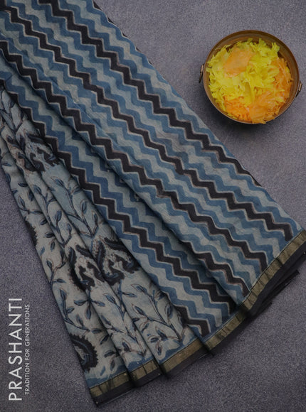 Chanderi bagru saree pastel blue shade and black with allover kalamkari prints and small zari woven border