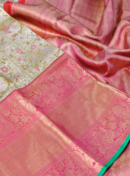 Pure kanchipuram tissue silk saree gold and pink with allover silver zari woven brocade weaves and long annam zari woven border