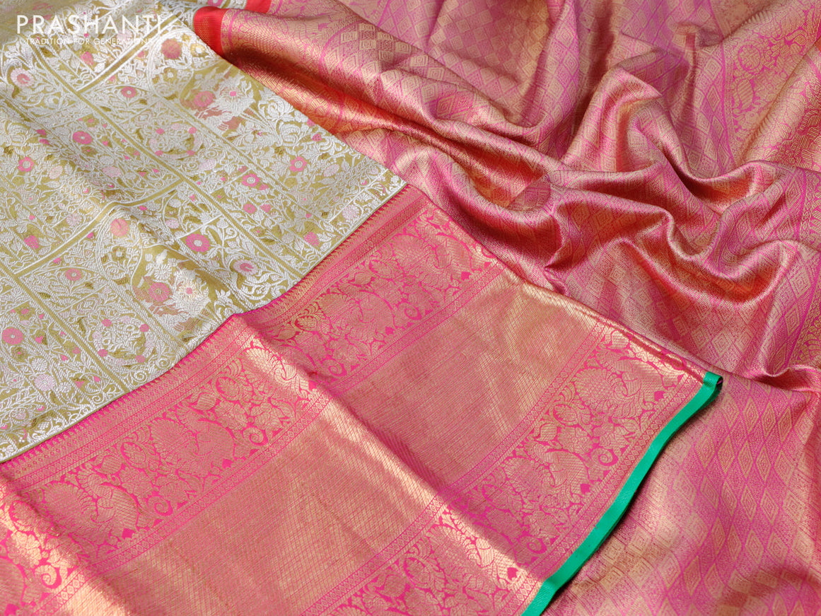 Pure kanchipuram tissue silk saree gold and pink with allover silver zari woven brocade weaves and long annam zari woven border