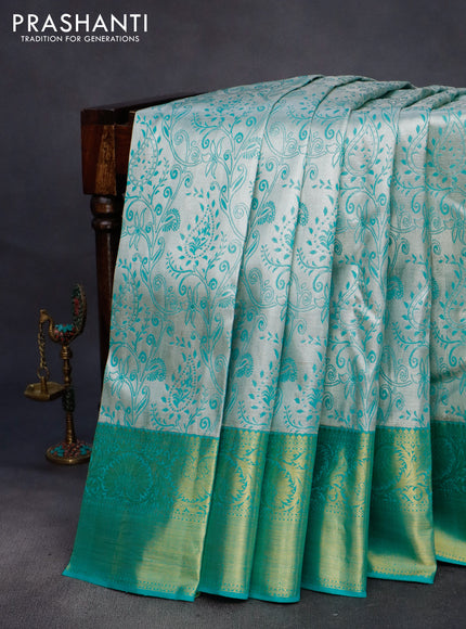 Pure kanchipuram tissue silk saree grey and teal green shade with allover silver zari woven brocade weaves and rich zari woven korvai border