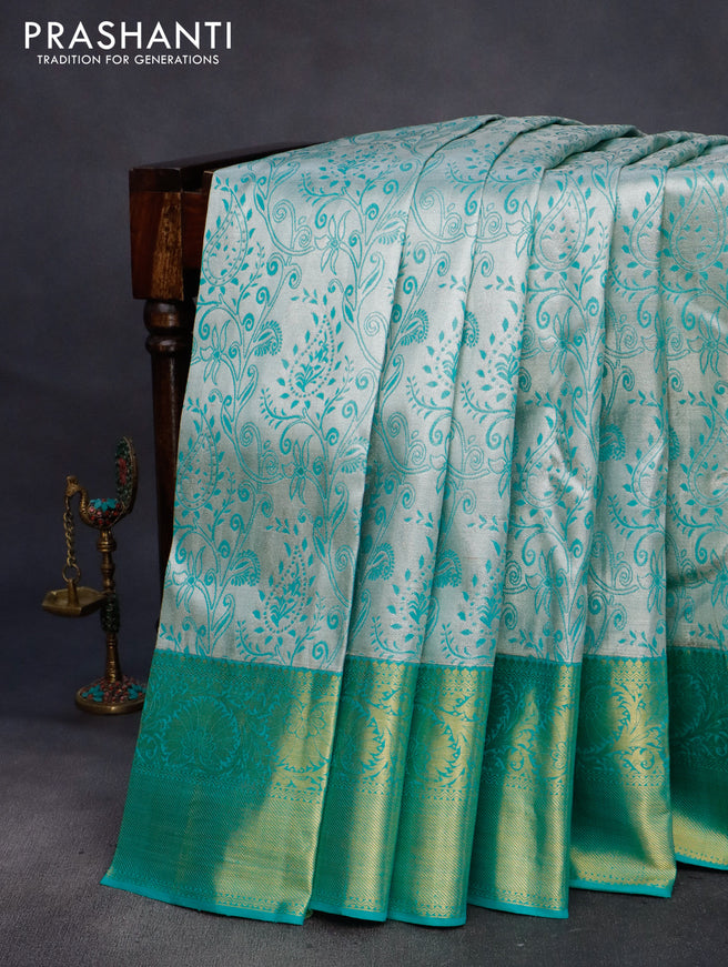 Pure kanchipuram tissue silk saree grey and teal green shade with allover silver zari woven brocade weaves and rich zari woven korvai border