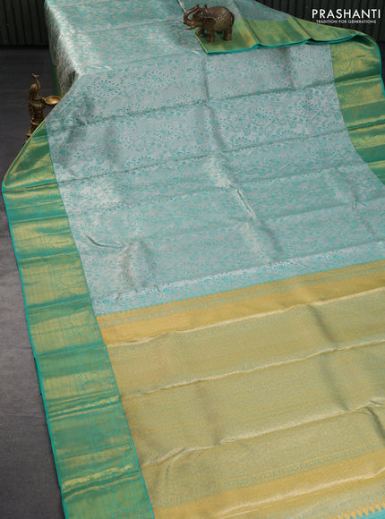 Pure kanchipuram tissue silk saree grey and teal green shade with allover silver zari woven brocade weaves and rich zari woven korvai border