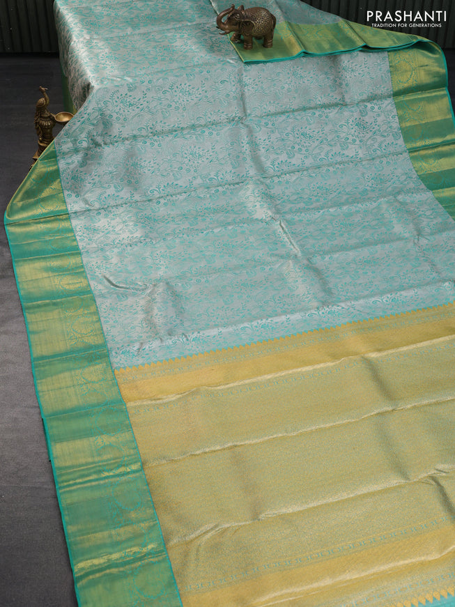 Pure kanchipuram tissue silk saree grey and teal green shade with allover silver zari woven brocade weaves and rich zari woven korvai border