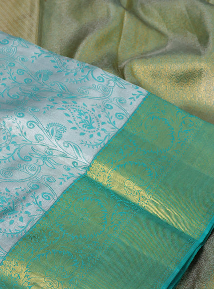 Pure kanchipuram tissue silk saree grey and teal green shade with allover silver zari woven brocade weaves and rich zari woven korvai border