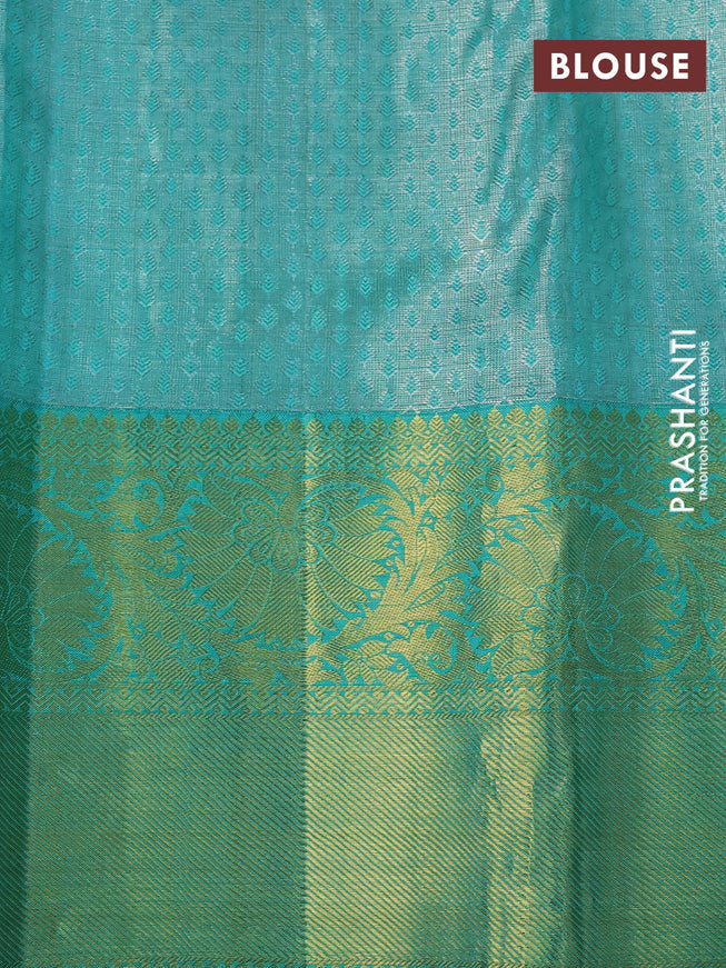 Pure kanchipuram tissue silk saree grey and teal green shade with allover silver zari woven brocade weaves and rich zari woven korvai border