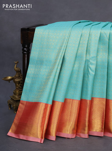 Pure kanchipuram silk saree teal blue and peach red with allover zari woven brocade weaves and zari woven border