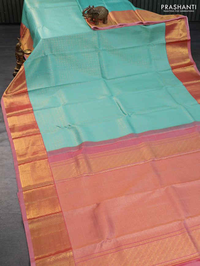 Pure kanchipuram silk saree teal blue and peach red with allover zari woven brocade weaves and zari woven border