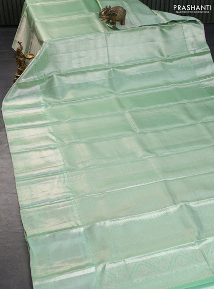 Pure kanchipuram tissue silk saree pastel green with allover silver zari woven brocade weaves and long silver zari woven border