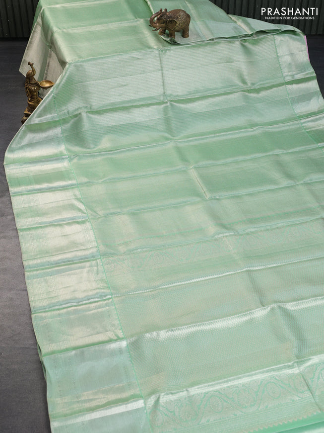 Pure kanchipuram tissue silk saree pastel green with allover silver zari woven brocade weaves and long silver zari woven border