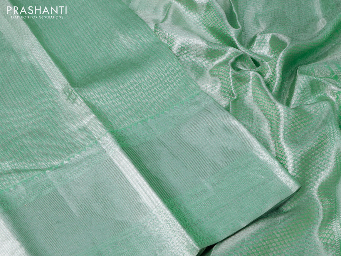 Pure kanchipuram tissue silk saree pastel green with allover silver zari woven brocade weaves and long silver zari woven border