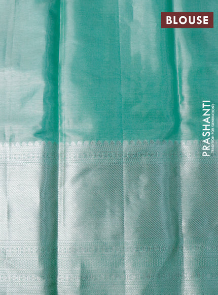 Pure kanchipuram tissue silk saree pastel green with allover silver zari woven brocade weaves and long silver zari woven border