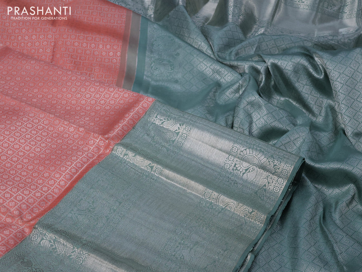 Pure kanchipuram silk saree peach shade and pastel green with allover silver zari woven brocade weaves and long silver zari woven border