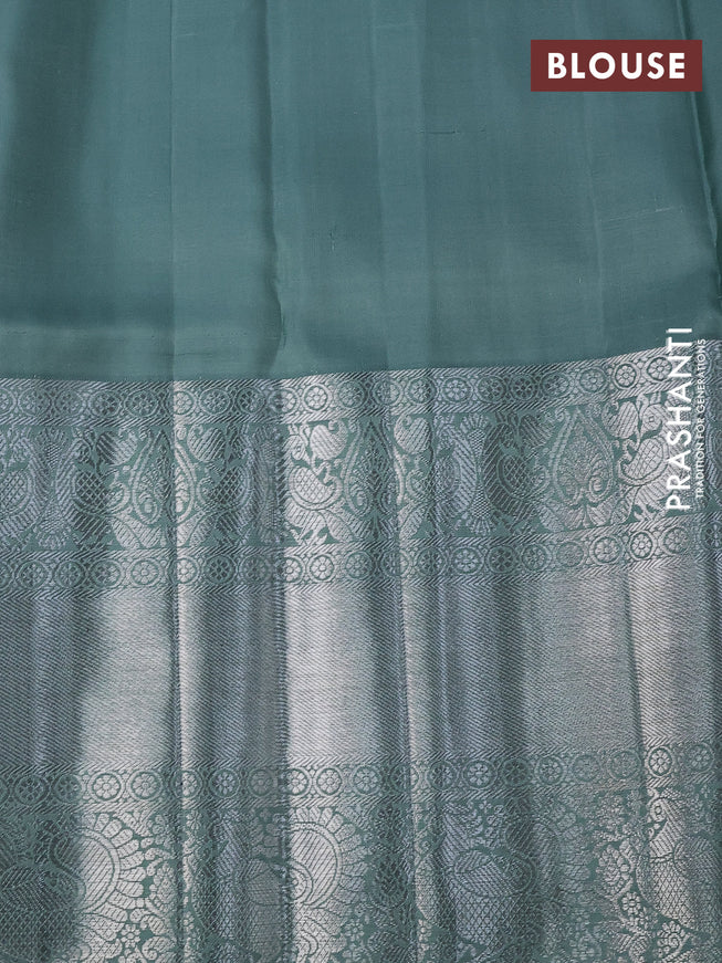 Pure kanchipuram silk saree peach shade and pastel green with allover silver zari woven brocade weaves and long silver zari woven border