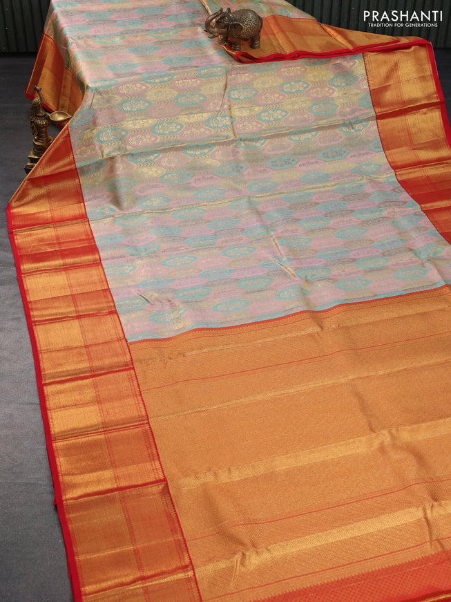 Pure kanchipuram tissue silk saree light pink teal blue and red with allover zari woven brocade weaves and long rich zari woven border