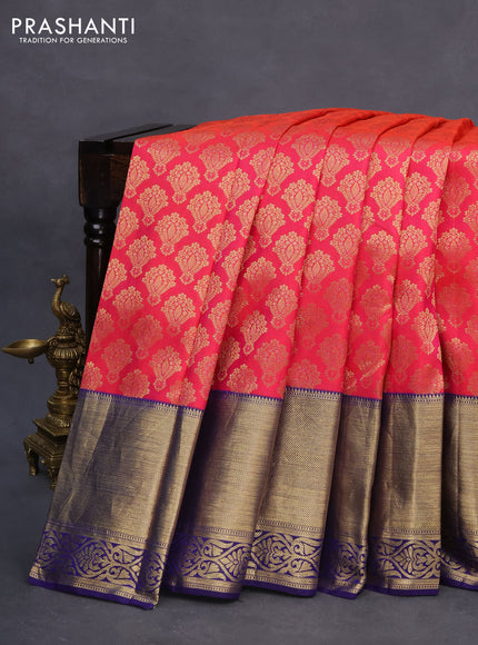 Pure kanchipuram silk saree dual shade of pinkish orange and dark blue with allover zari woven brocade weaves and long zari woven border