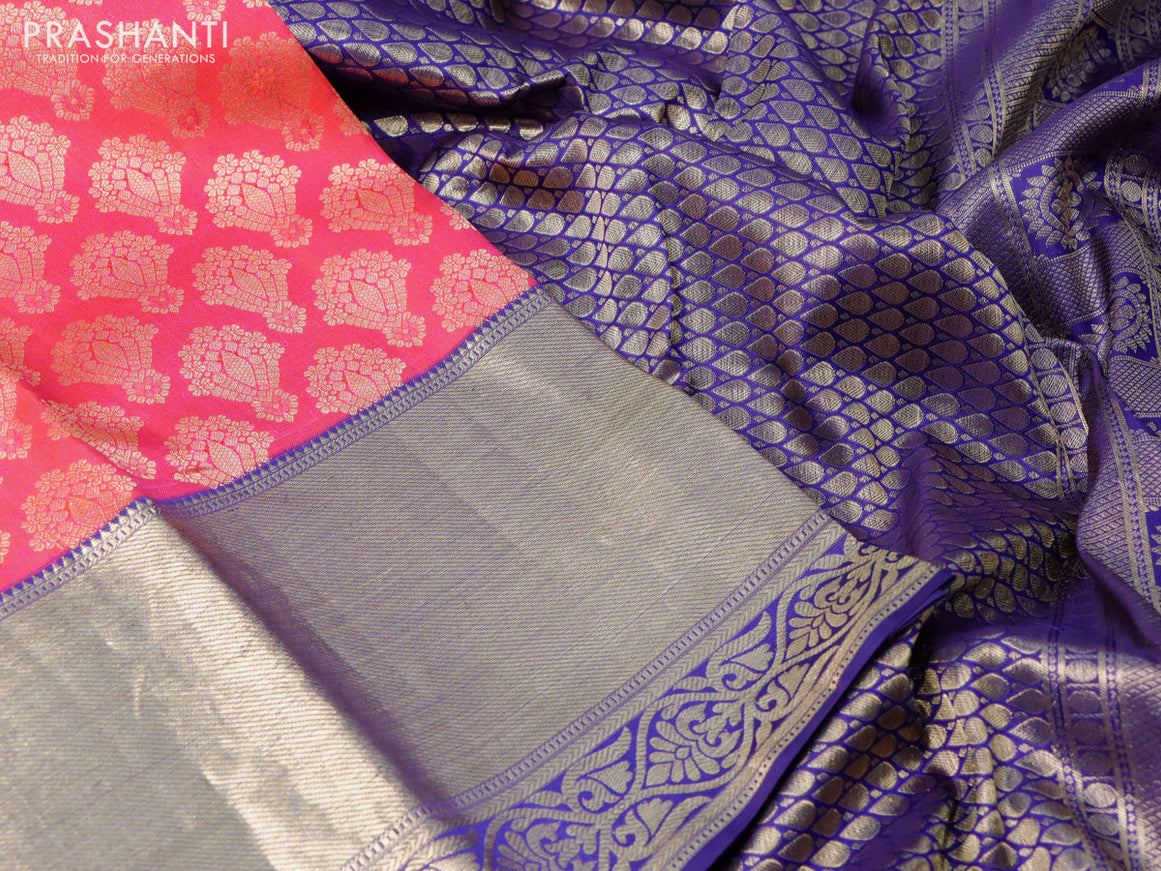 Pure kanchipuram silk saree dual shade of pinkish orange and dark blue with allover zari woven brocade weaves and long zari woven border