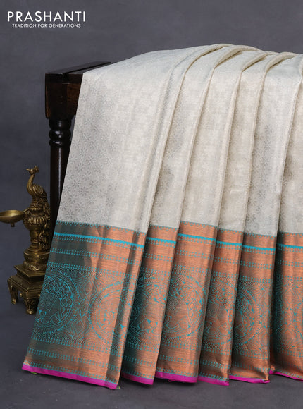 Pure kanchipuram tissue silk saree off white and dual shade of teal blue with allover silver zari woven brocade weaves and long copper zari woven border