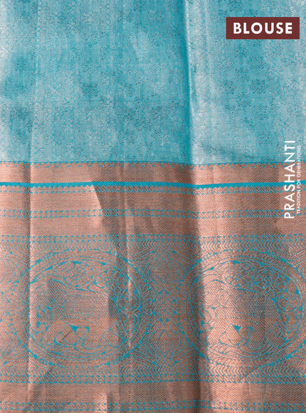 Pure kanchipuram tissue silk saree off white and dual shade of teal blue with allover silver zari woven brocade weaves and long copper zari woven border