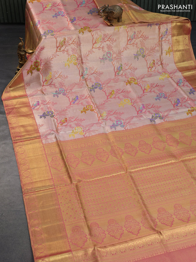 Pure kanchipuram tissue silk saree dual shade of peach pink with allover zari woven brocade weaves and long rich zari woven border