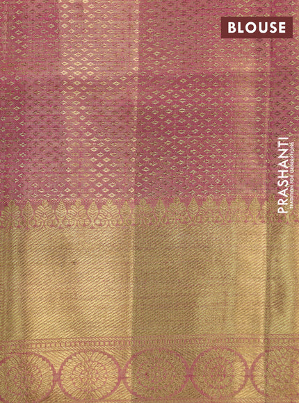 Pure kanchipuram tissue silk saree dual shade of peach pink with allover zari woven brocade weaves and long rich zari woven border