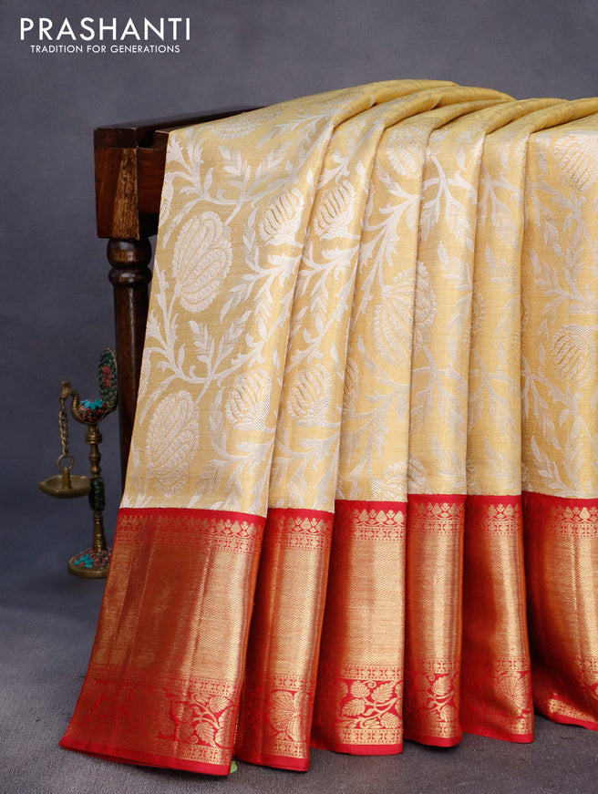 Pure kanchipuram tissue silk saree gold and maroon with allover zari woven brocade weaves and long rich zari woven border