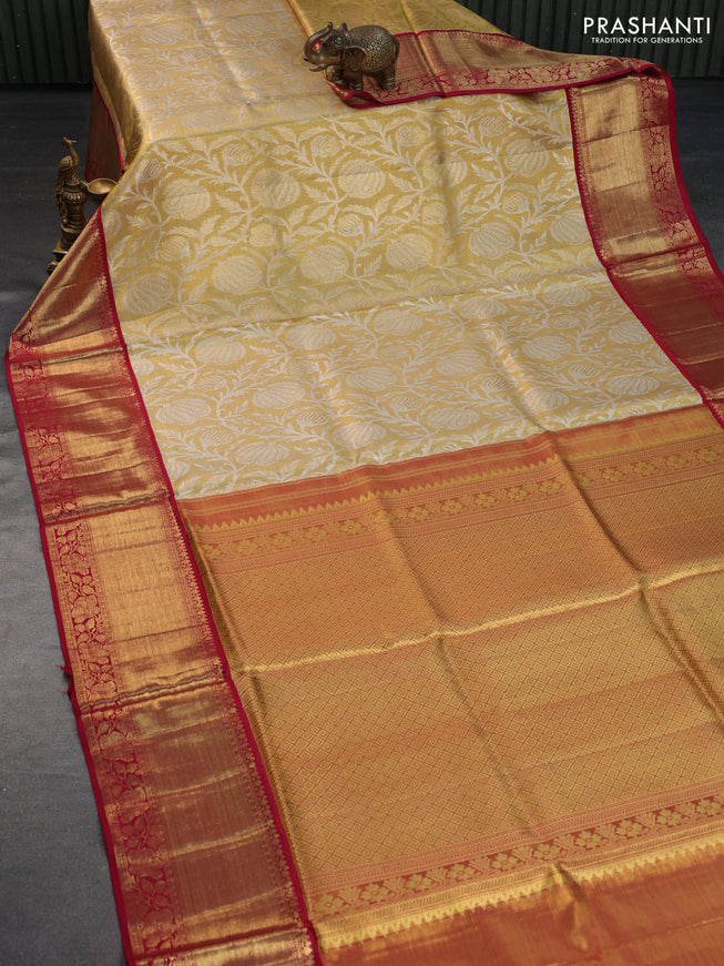 Pure kanchipuram tissue silk saree gold and maroon with allover zari woven brocade weaves and long rich zari woven border