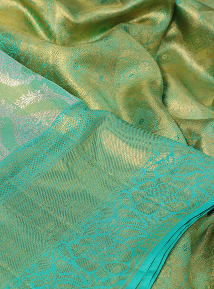 Pure kanchipuram tissue silk saree dual shade of teal blue shade with allover zari woven brocade weaves and long rich zari woven border