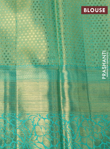 Pure kanchipuram tissue silk saree dual shade of teal blue shade with allover zari woven brocade weaves and long rich zari woven border