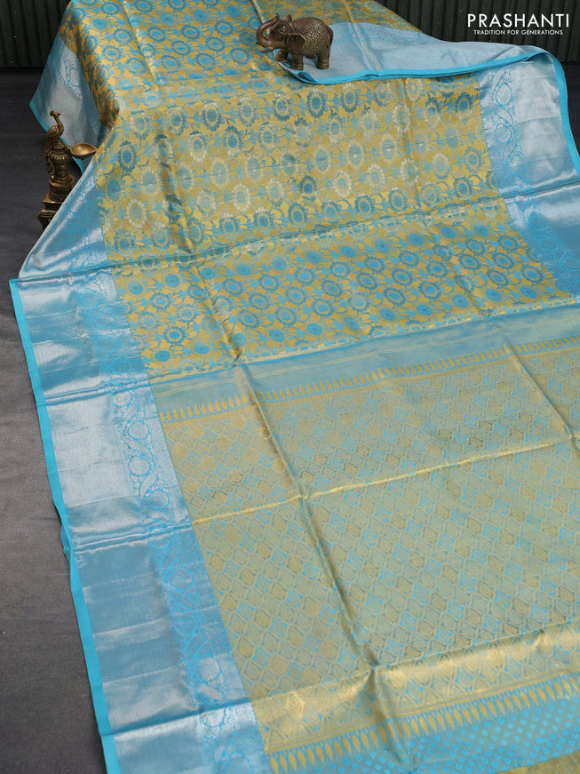 Pure kanchipuram tissue silk saree gold and light blue with allover zari woven brocade weaves and long silver zari woven border